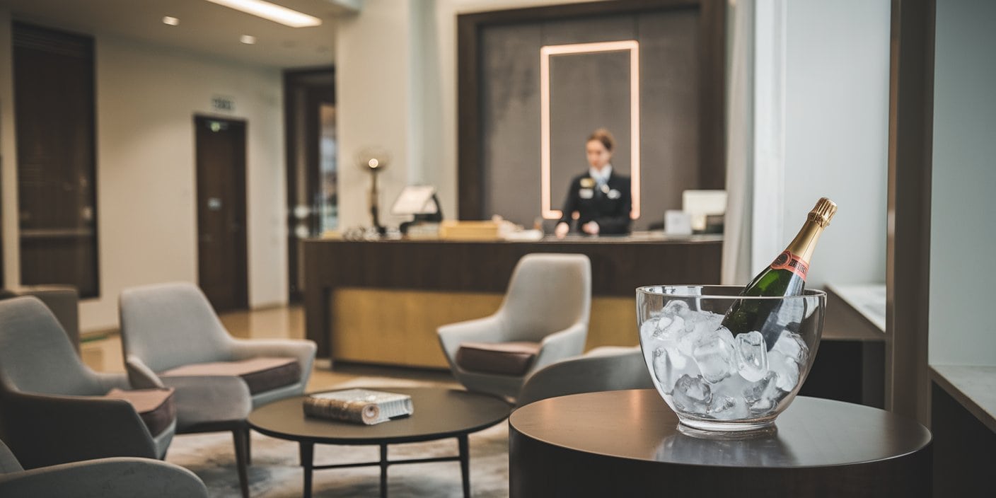 A photo of a private check-in lounge onboard