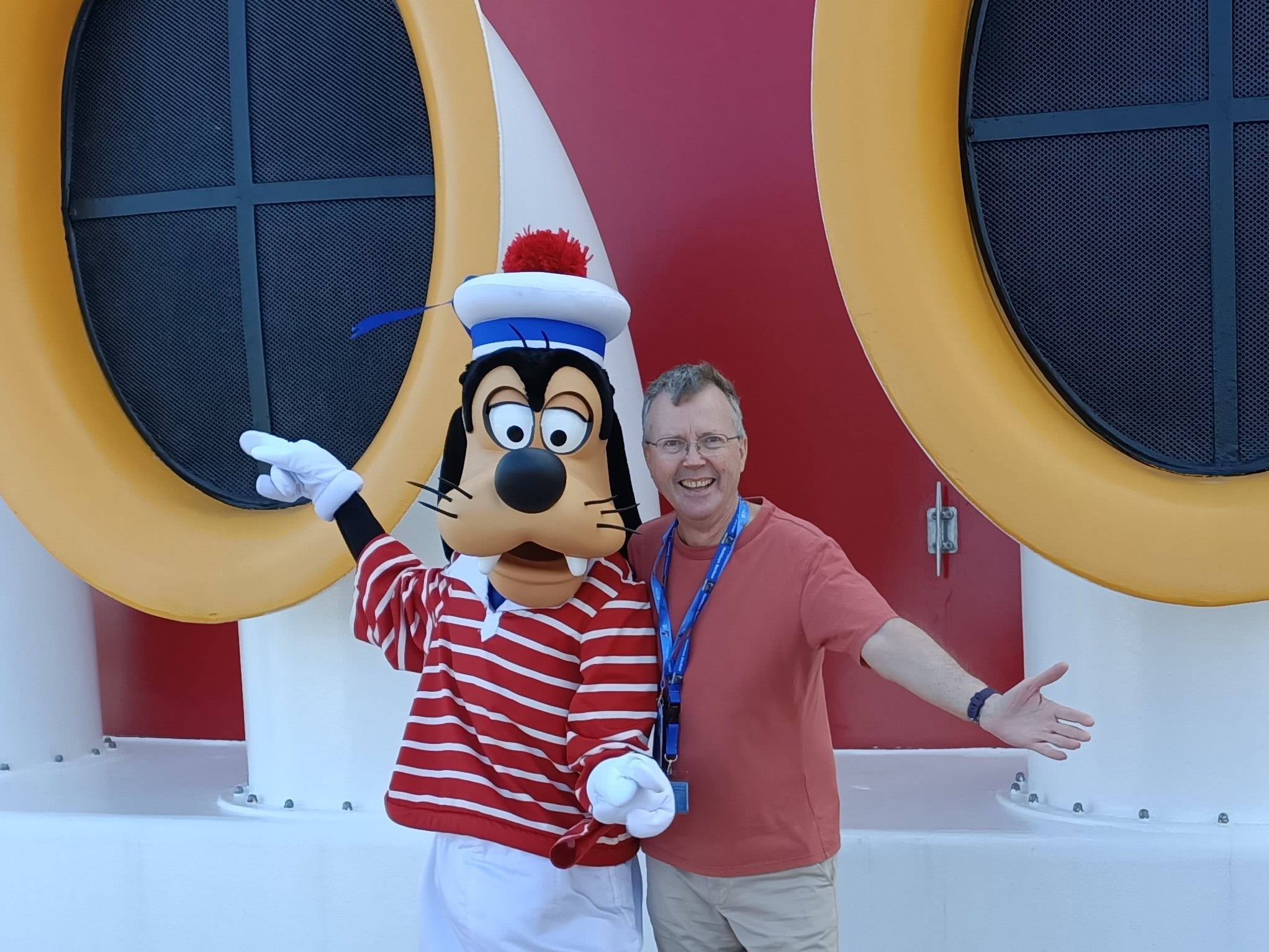 Philip Clape with Goofy onboard Disney Wonder